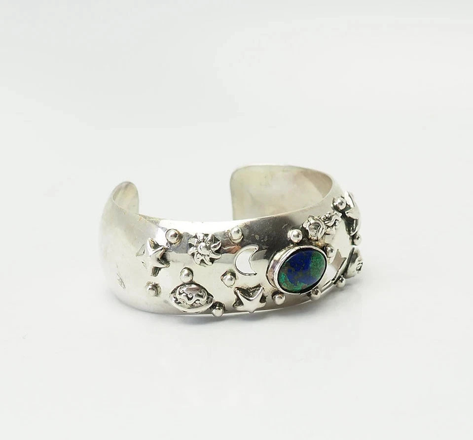 Star planets cosmic celestial bodies wide sterling silver bracelet Carol Felley