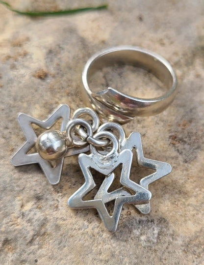 sterling silver 9.2 grams with stars charms 925 ring size 6.75